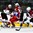 GRAND FORKS, NORTH DAKOTA - APRIL 18: Latvia's Roberts Kalkis #27 checks Russia's Alexei Lipanov #10 while Latvia's Emils Gegeris #20 and Haralds Strombergs #26 defend during preliminary round action at the 2016 IIHF Ice Hockey U18 World Championship. (Photo by Matt Zambonin/HHOF-IIHF Images)

